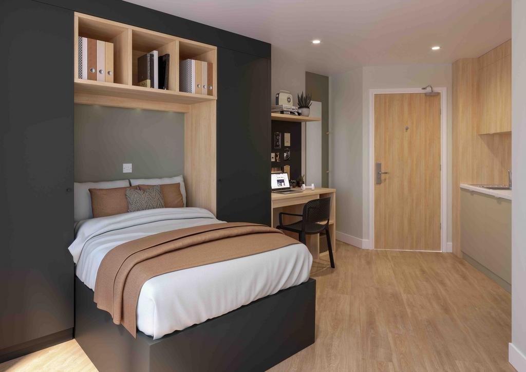 A modern and inviting double bedroom featuring ...