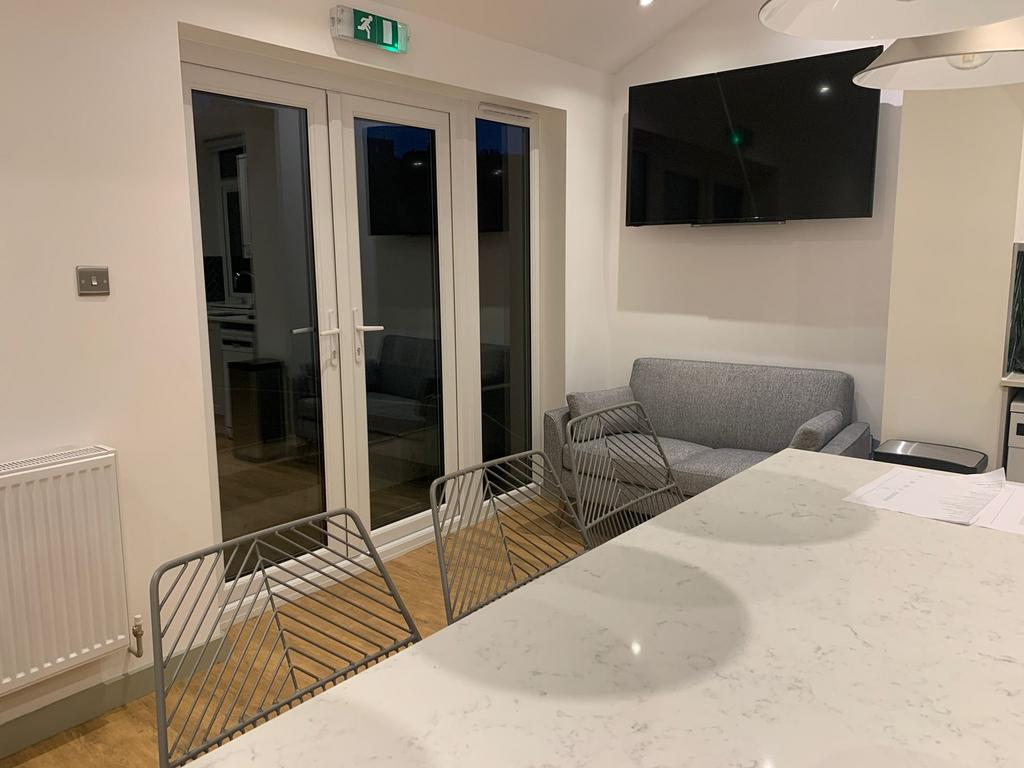A modern and inviting living room with stylish ...