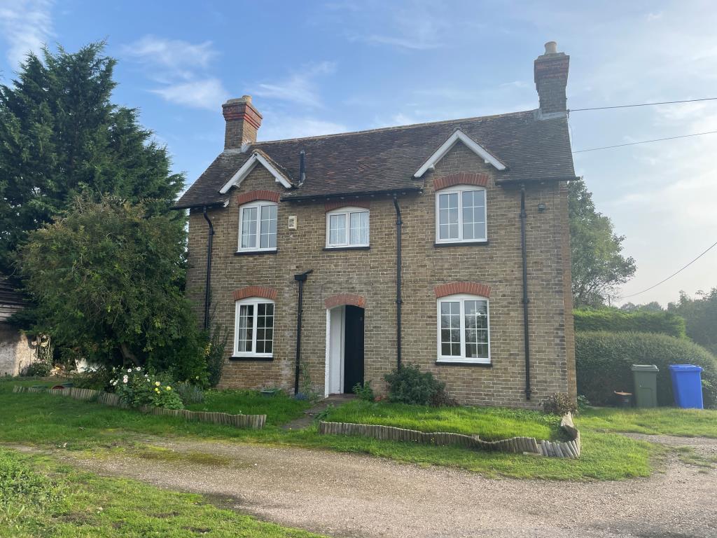Detached cottage with driveway