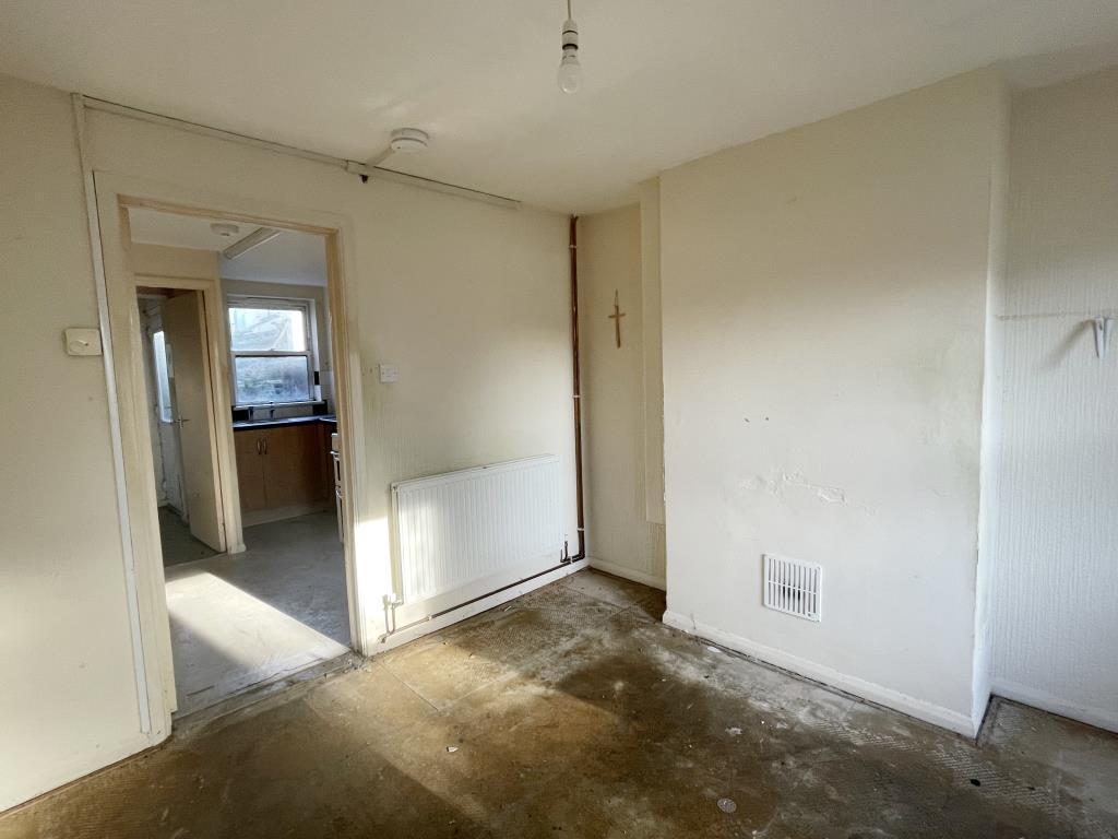 Living room of house in need of improvement