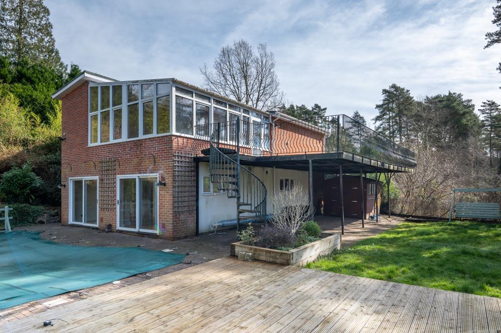 House with balcony and swimming pool