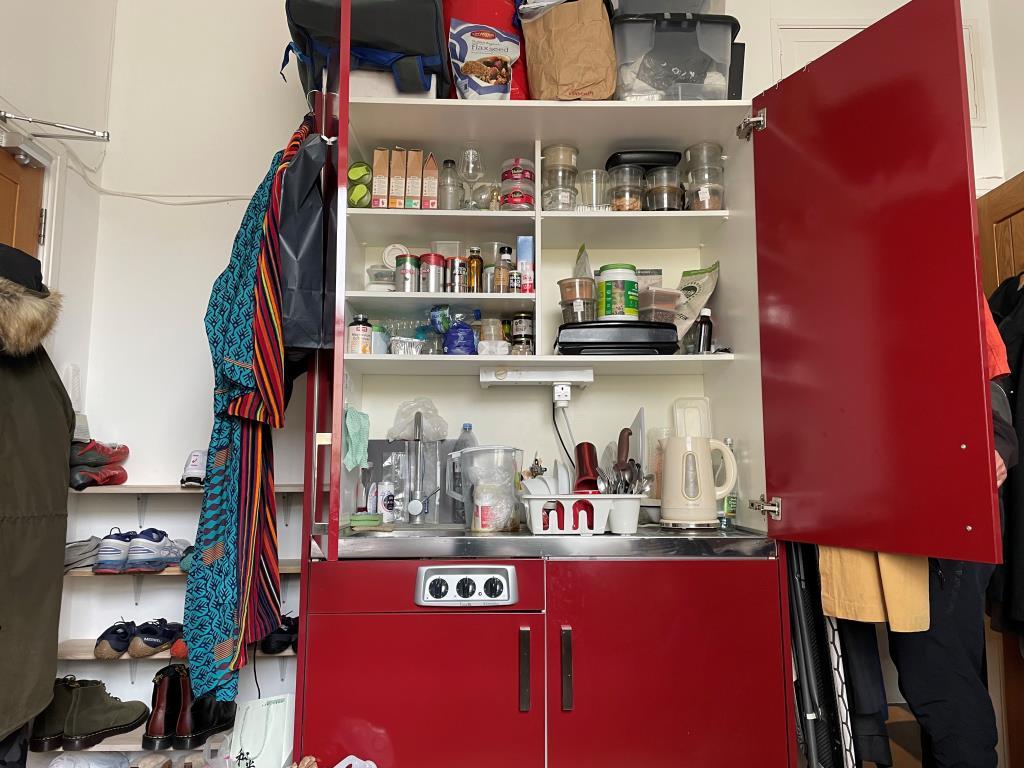 Red kitchenette of flat 2