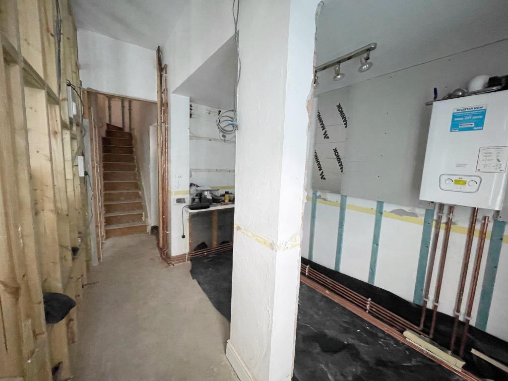 Reception area on ground floor with room to the le