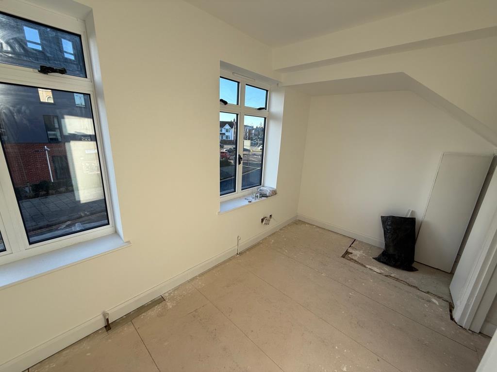 First floor room with two double glazed windows to