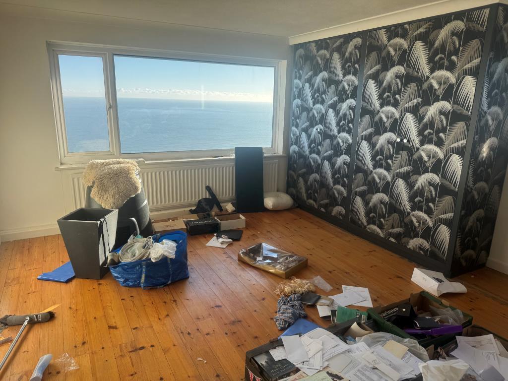 Looking from rear to front in one of the bedrooms