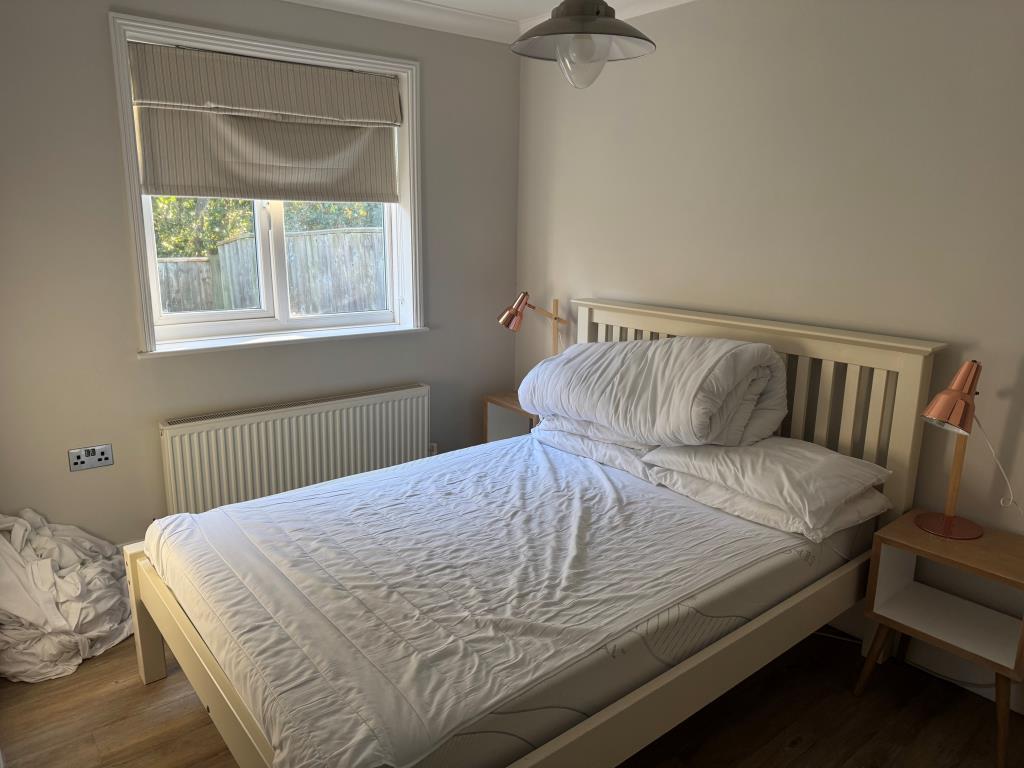 The larger of the two bedrooms