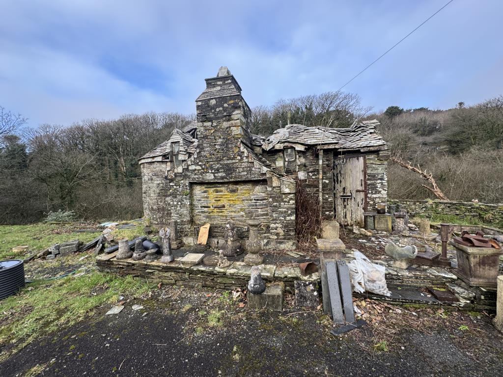 View of the dilapidated outbuilding