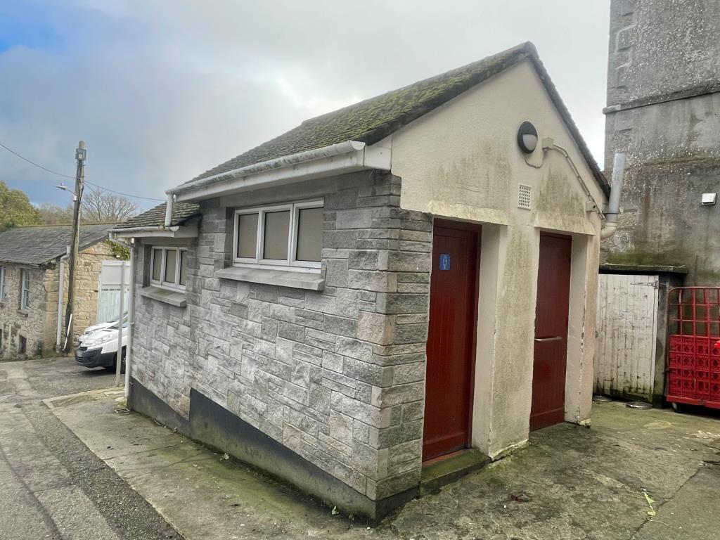 Exterior of toilet block showing access points to