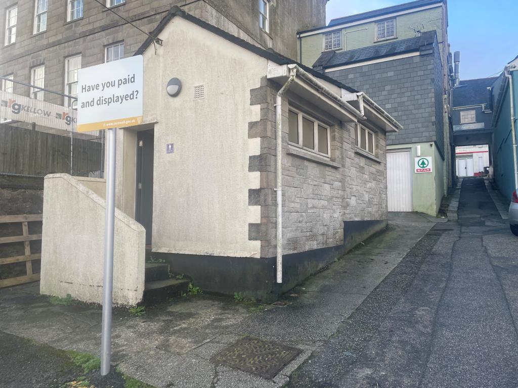Exterior of toilet block showing steps leading to
