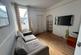 Communal living room in property