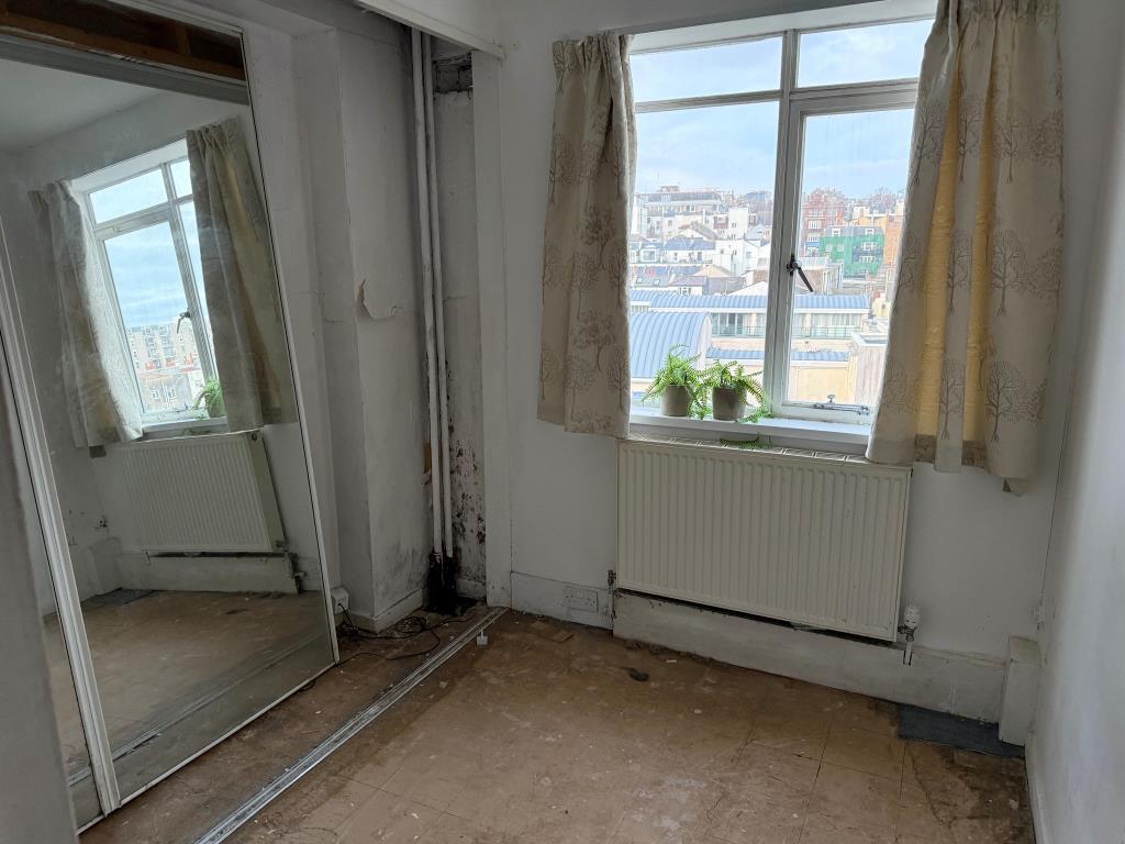 Bedroom with window to rear