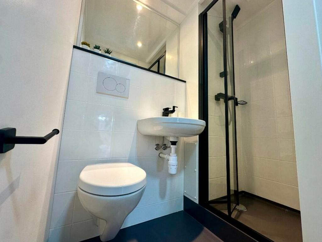 A modern and clean bathroom with a sleek design...