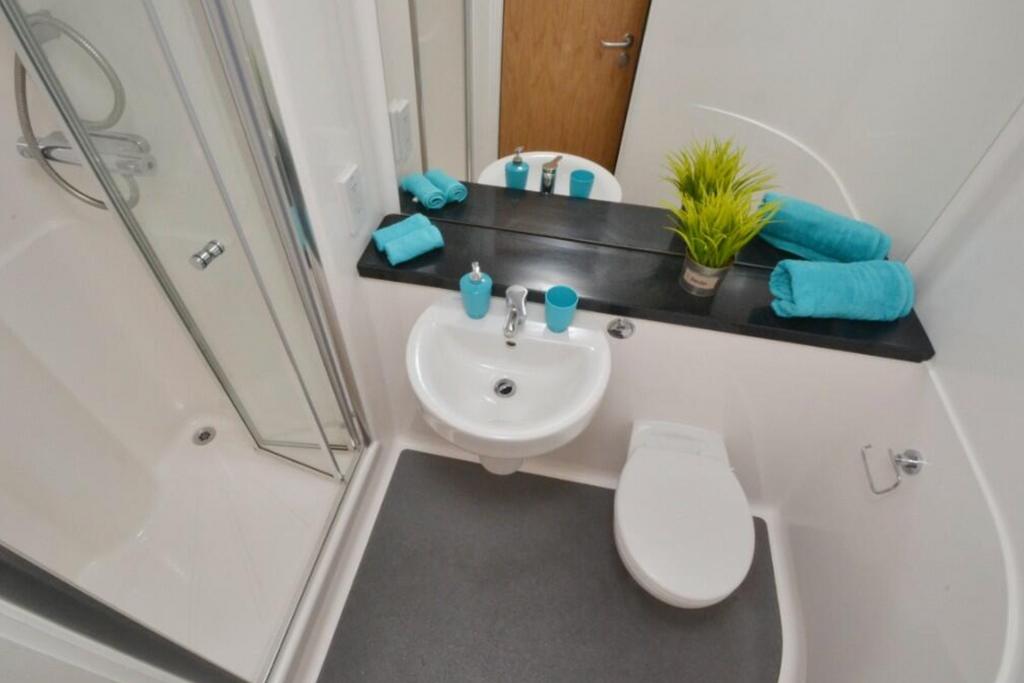 A modern and clean bathroom featuring stylish f...