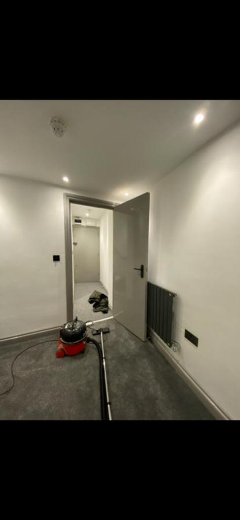 A modern and well-maintained hallway with good ...