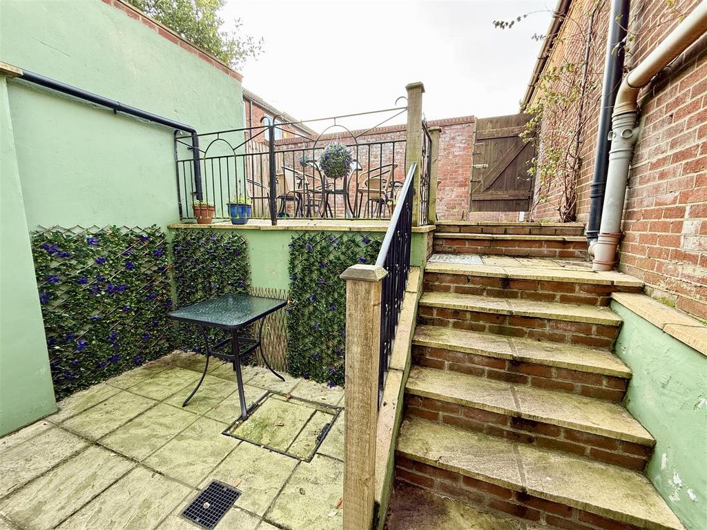 Steps to raised couryard garden