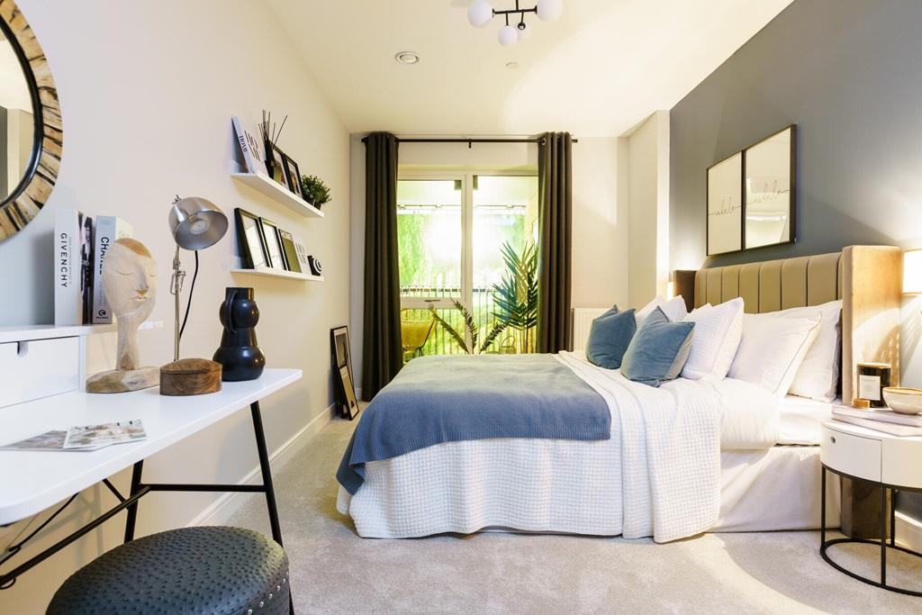 Large bedroom with double doors onto a private...