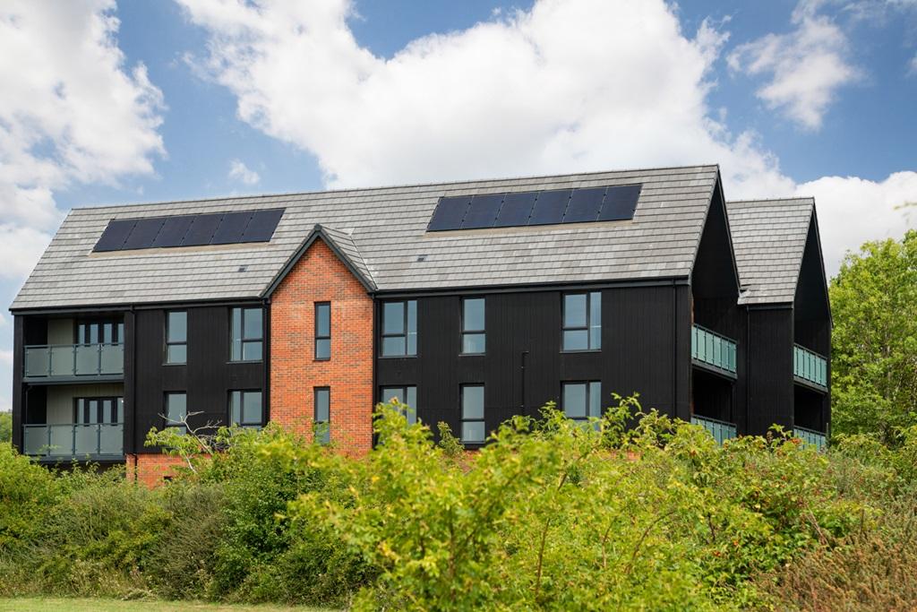 Each home features solar panels to help towards...