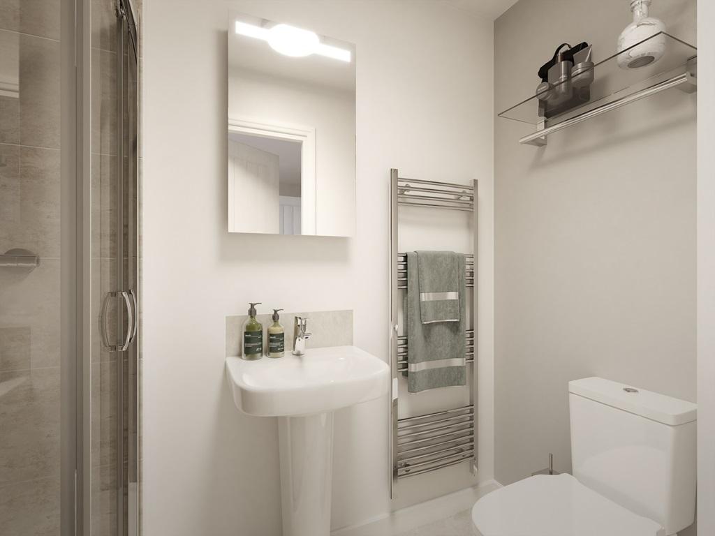 The main bedroom features an en suite for added...