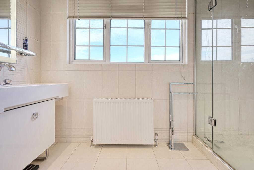 En suite shower and vanity unit to master bedroom.