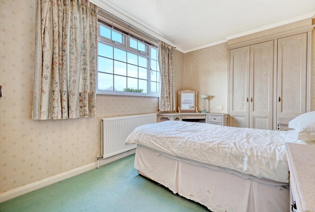 Bedroom Three with fitted wardrobes