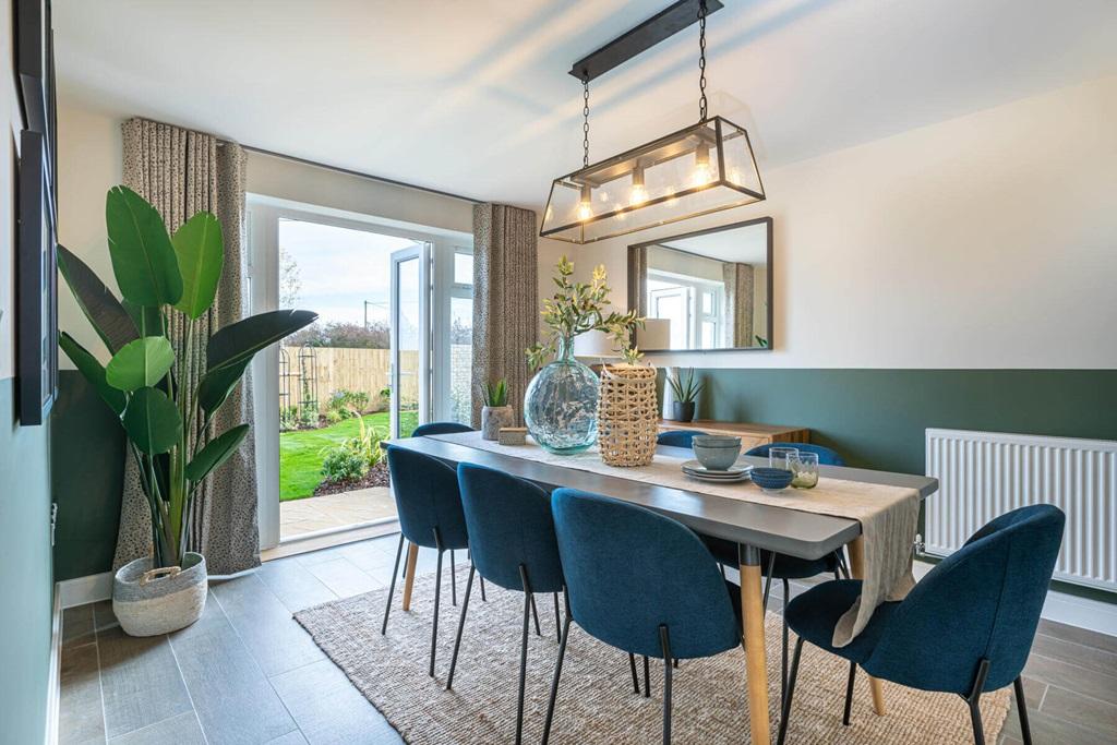 Overlook the garden as you cook and dine