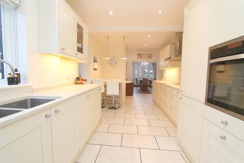 4 Redford Avenue, Wallington, SM6 9DP