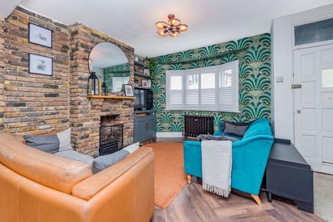 30 Mill Road, London, SW19 2NE