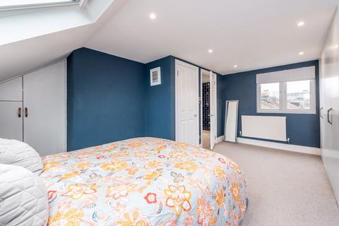 30 Mill Road, London, SW19 2NE