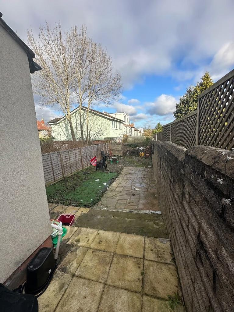 A spacious garden area with potential for relax...