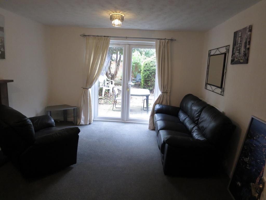 A spacious and inviting large modern living roo...