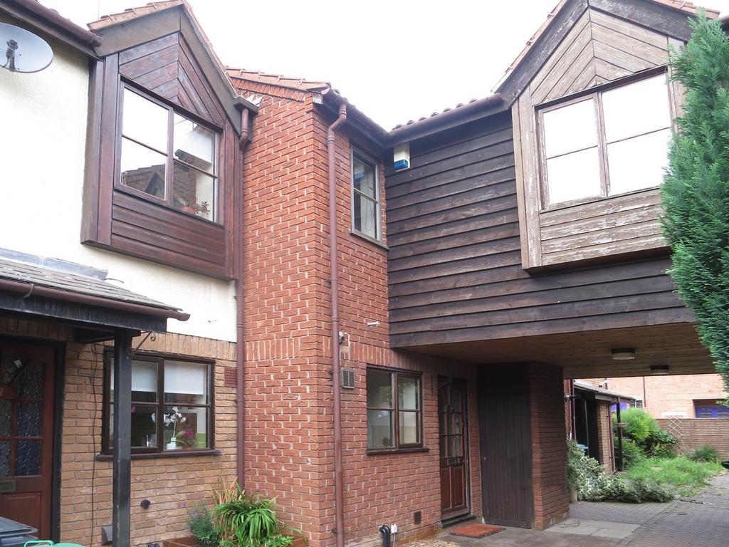 A charming exterior of a property showcasing a ...
