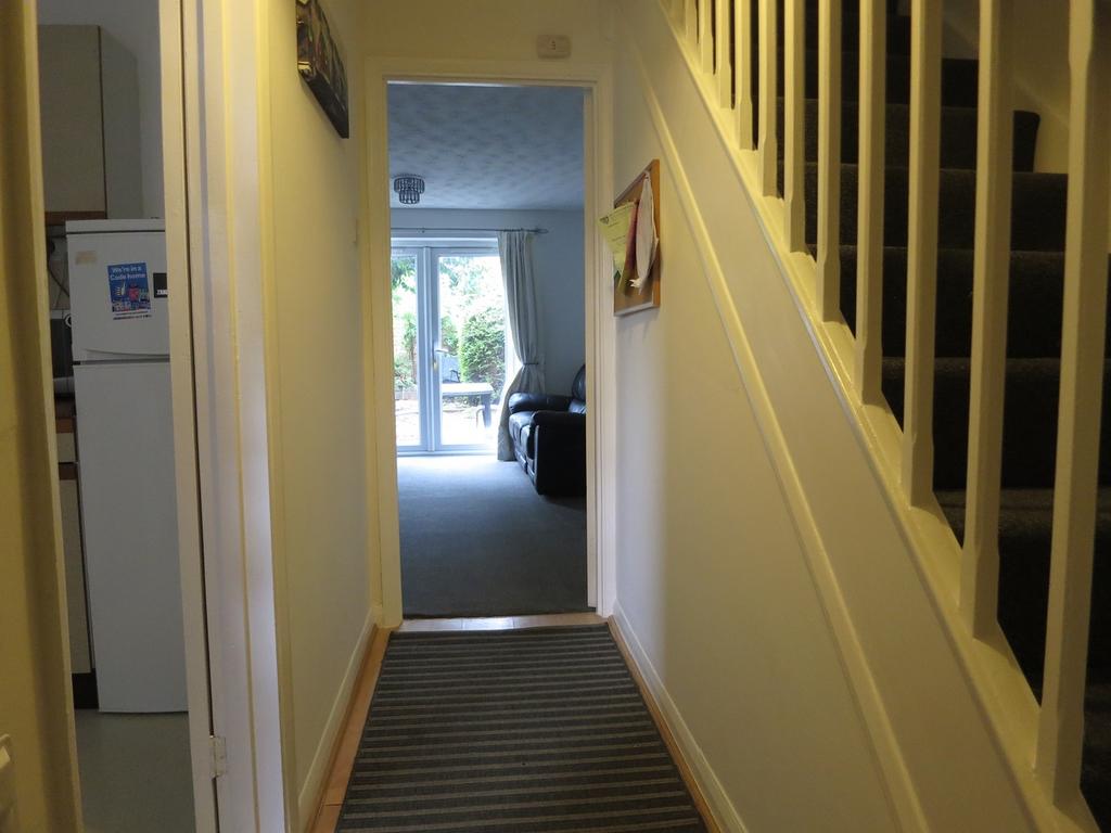 A spacious and well-maintained hallway leading ...