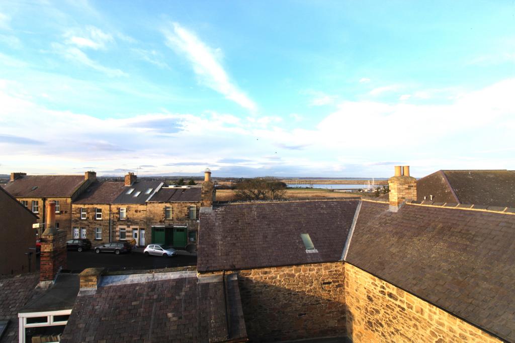 Window view from top floor - over estuary to...