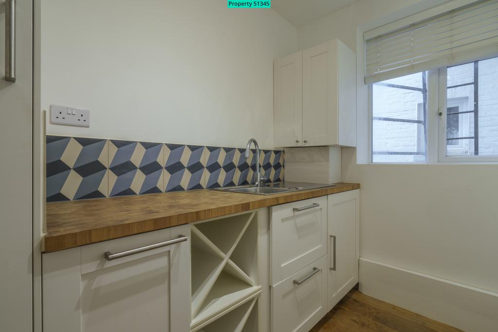 Laundry room wine storage