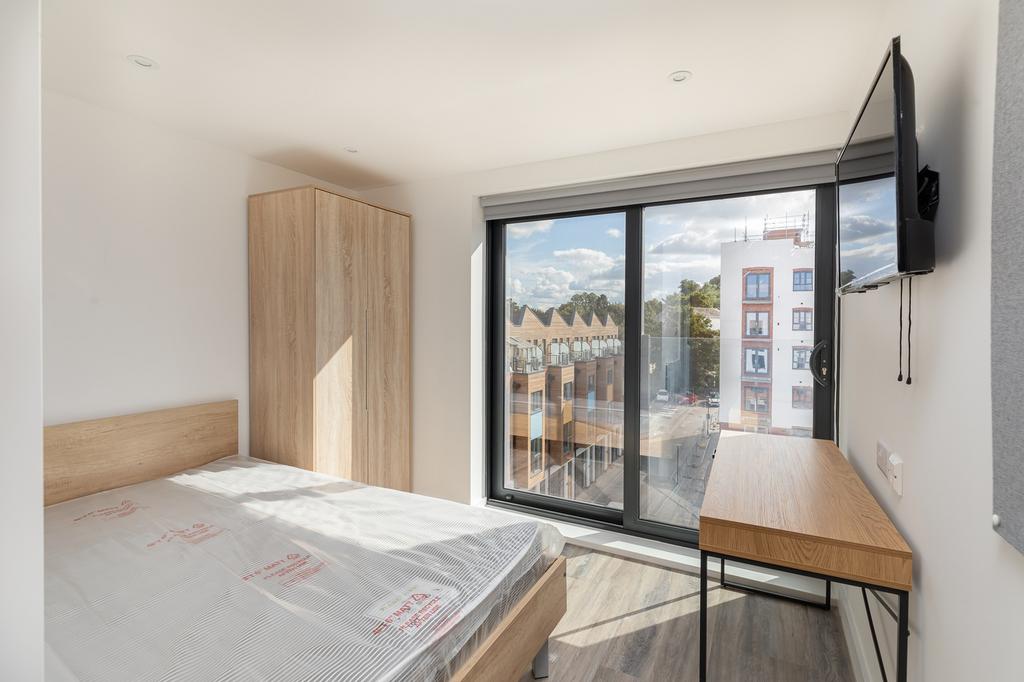 A bright and inviting double bedroom perfect fo...