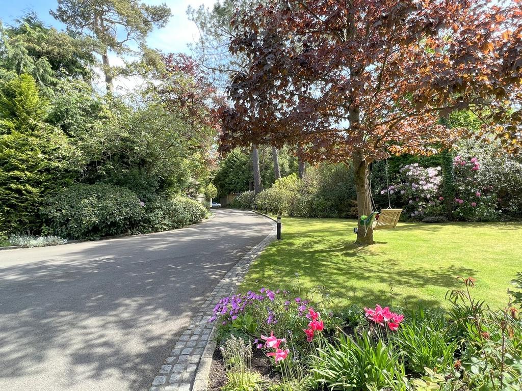 Private driveway and front garden