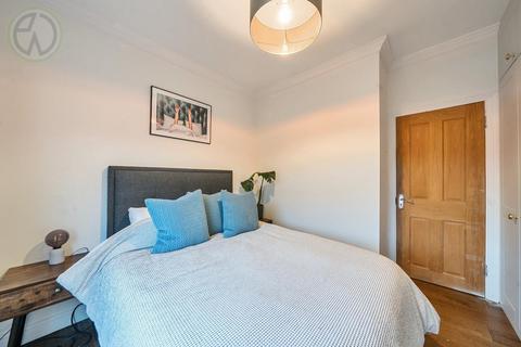 9a Warren Road, London, SW19 2HY