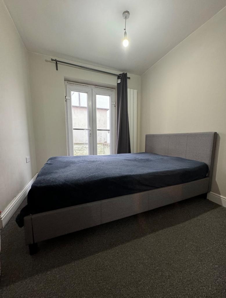 A cozy and inviting double bedroom, perfect for...