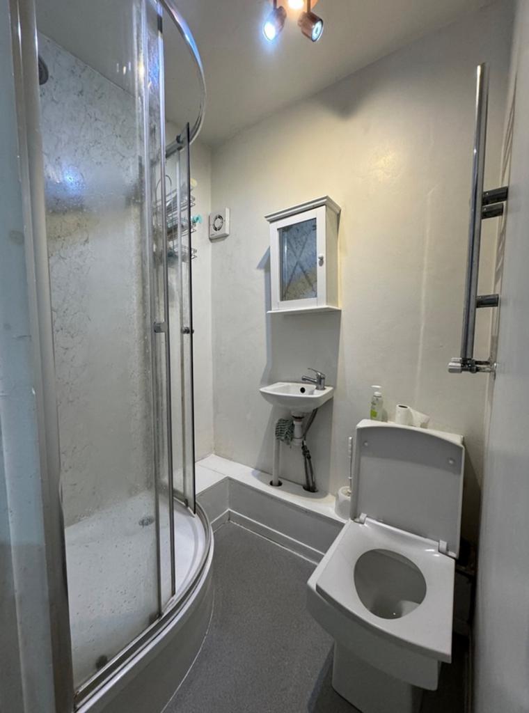 A modern and clean bathroom featuring a sleek s...