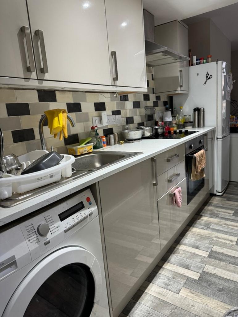 A modern kitchenette with contemporary finishes...