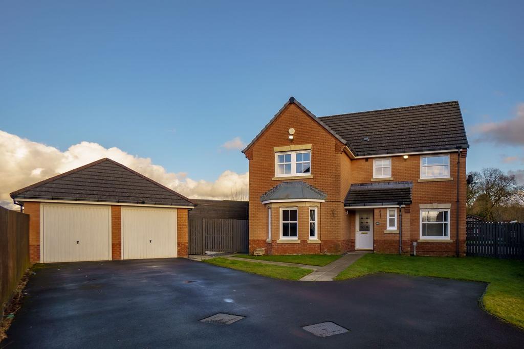Double garage and driveway