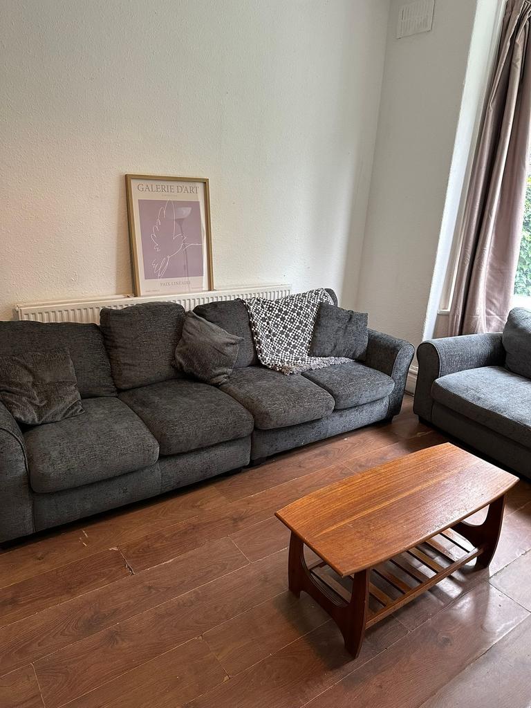 A comfortable living room featuring a large dar...