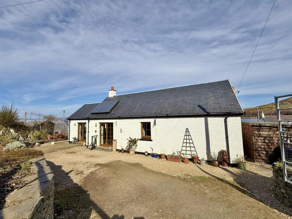 Rear and driveway