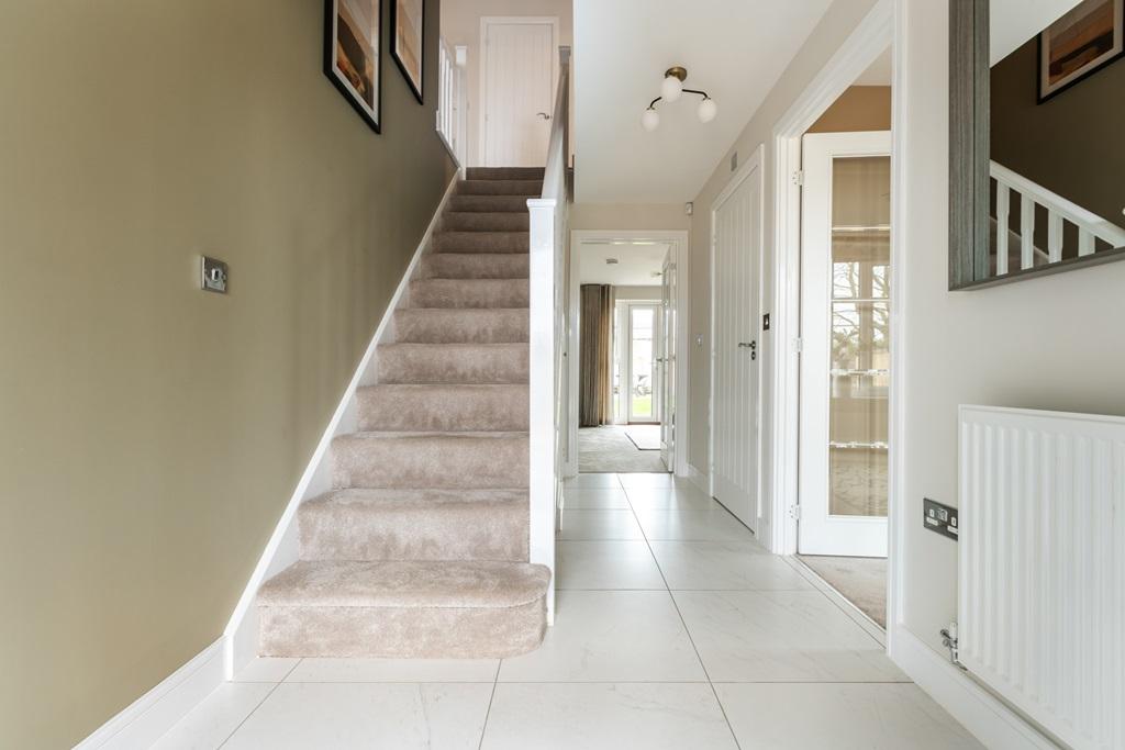 The central hallway with under stairs storage