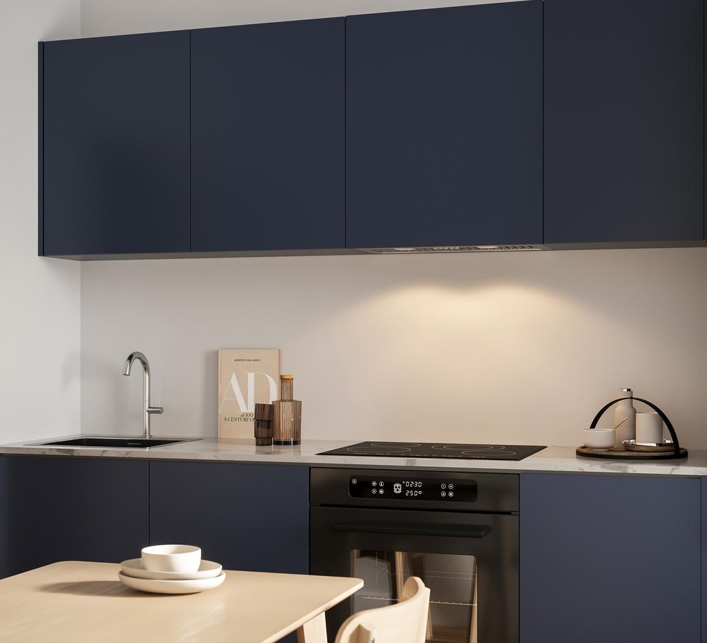 A modern kitchen featuring dark cabinetry, a sl...
