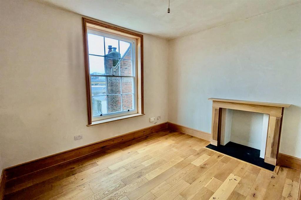 Bright Characterful Bedroom.jpeg