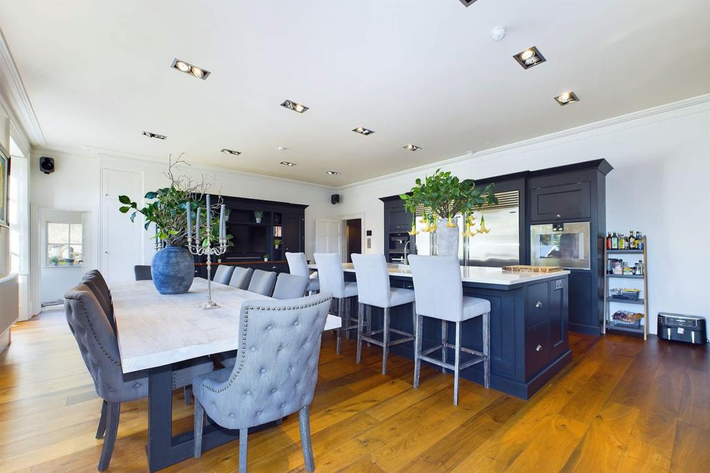 Contemporary kitchen with island and dining