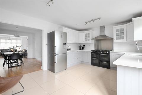 56 Wolsey Crescent, Morden, SM4 4TD