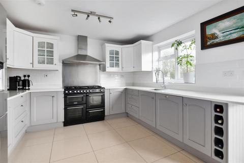 56 Wolsey Crescent, Morden, SM4 4TD