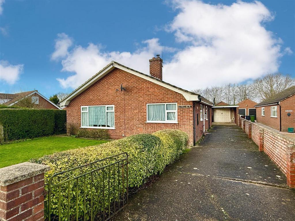 Front aspect and driveway
